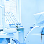 Professional Dentist tools in the dental office. Dental Hygiene and Health conceptual image. Blue image.